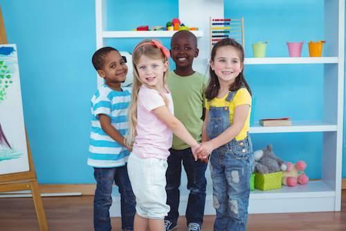 Kids playing at school after dental cleanings in Decatur, IL