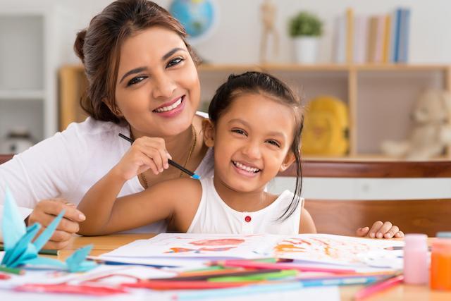 Mother & daughter painting I restorative dentistry decatur il