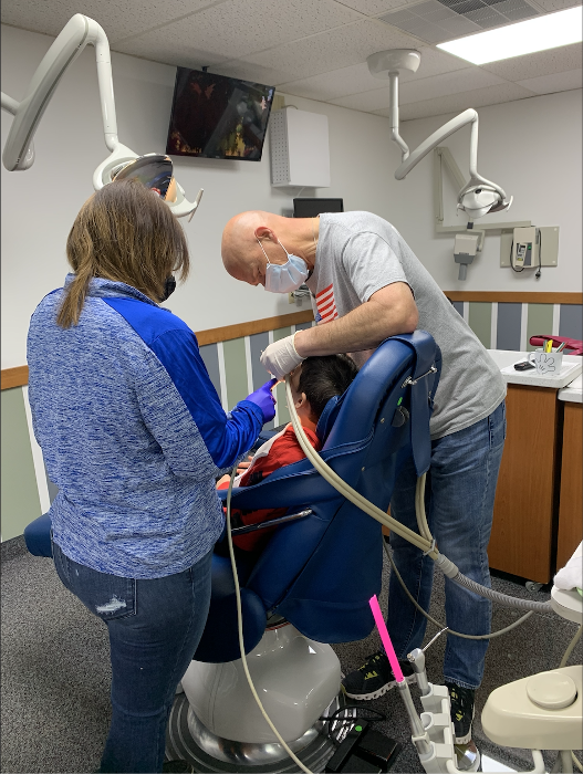 Kid undergoing dental cleaning in Decatur, IL