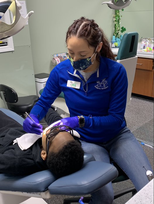 Kid undergoing dental cleaning in Decatur, IL