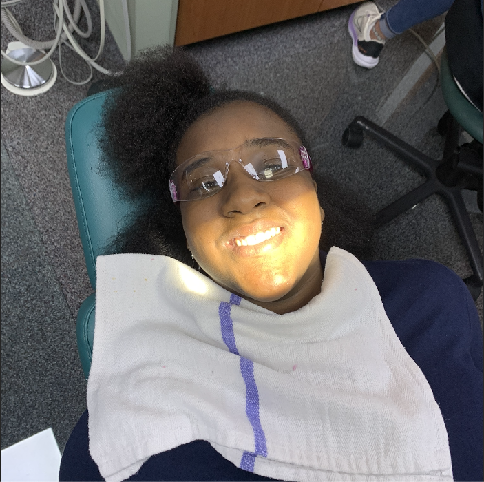 Kid smiling after dental check up and cleaning at Jerger Pediatric Dentistry