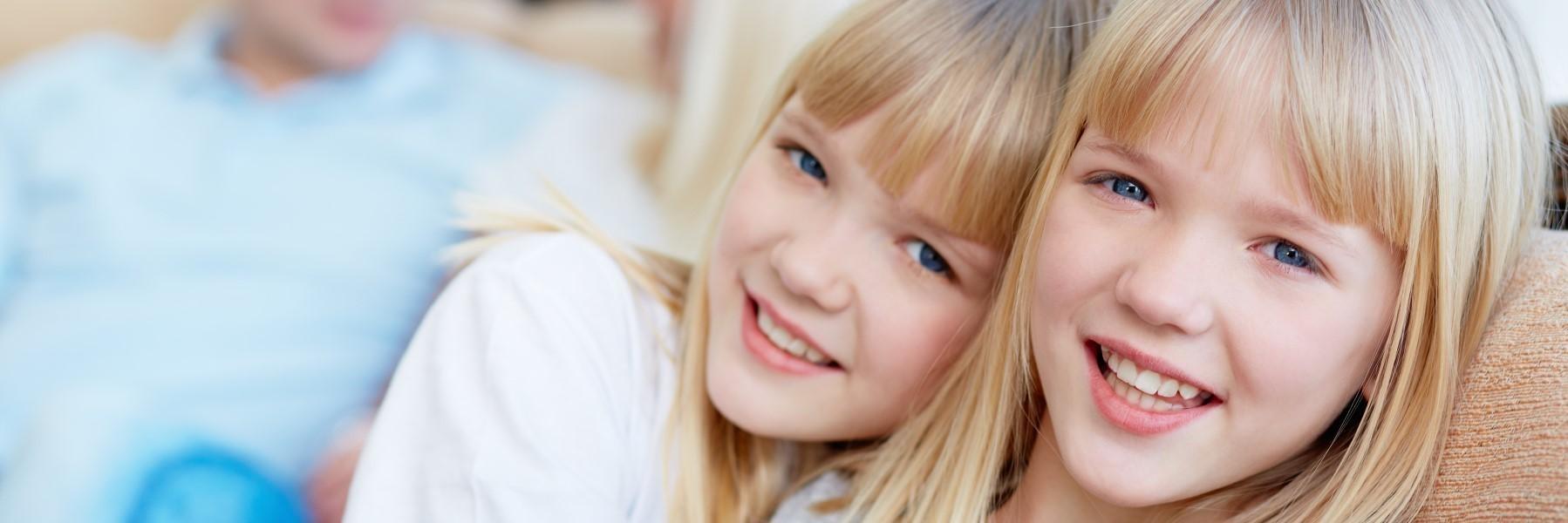 Two young girls smiling after Orthodontics treatment in Decatur, IL