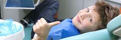 Child relaxing during dental check up and examination in Decatur, IL