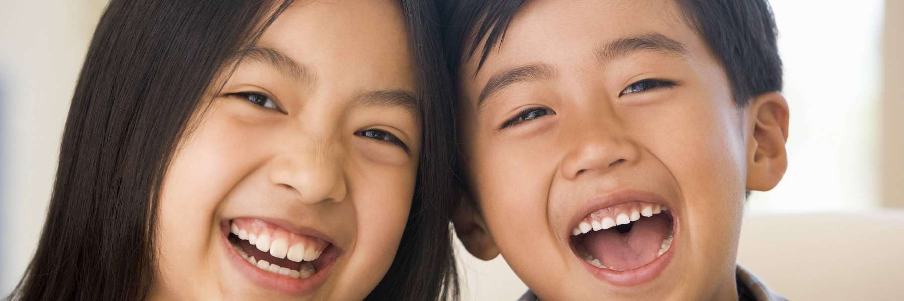 Kids smiling after Children's Orthodontics at Jerger Pediatric Dentistry