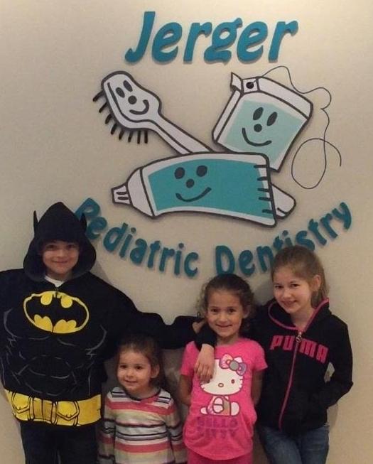 Kids smiling after dental check up at Jerger Pediatric Dentistry