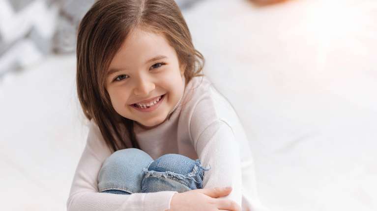 Girl smiling after Children's Orthodontics at Jerger Pediatric Dentistry