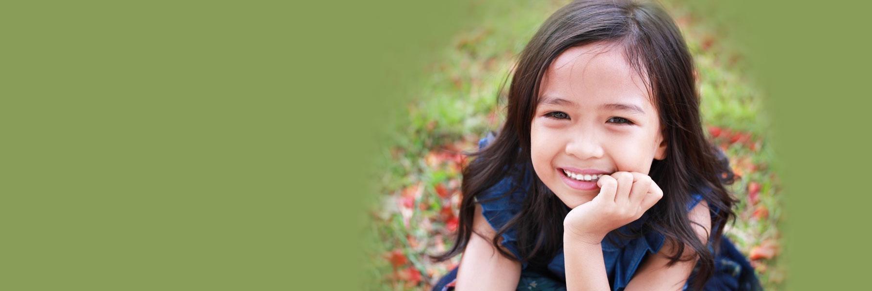 Little girl smiling outside | Children's Sedation Dentistry Decatur IL