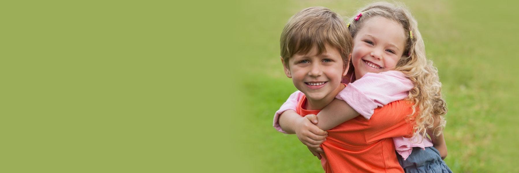 Brother & Sister Outside | Children's Restorative Dentist Decatur, IL