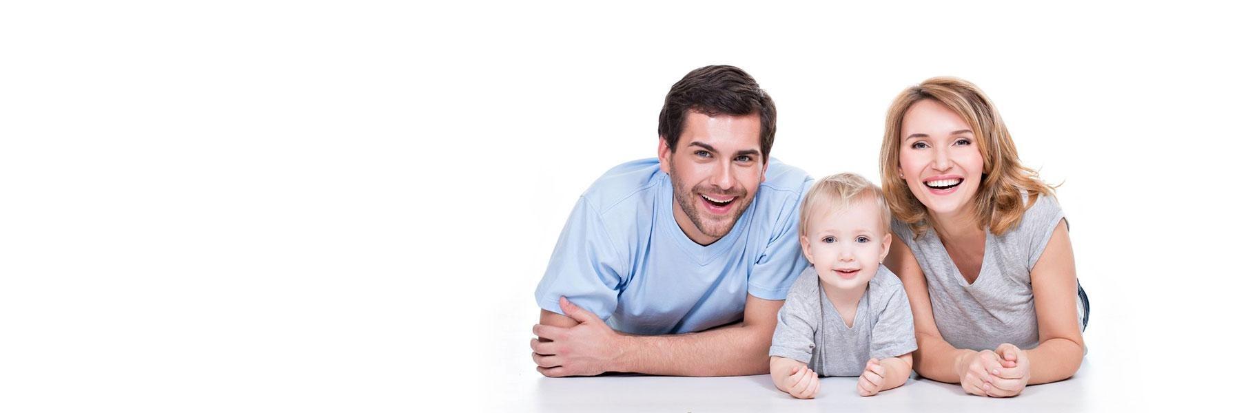 Parents and Baby smiling | Dentist in Decatur, IL